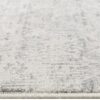 Gray textured rug with abstract pattern