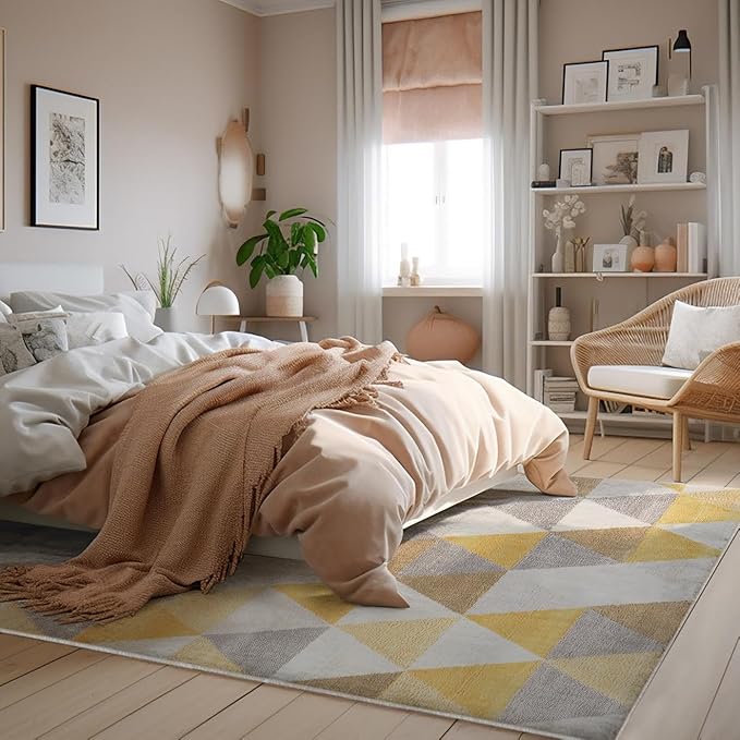 Cozy bedroom with modern decor and geometric rug.