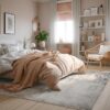 Cozy bedroom with pastel decor and natural light.