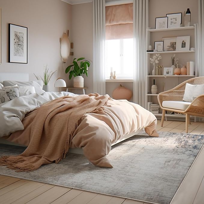 Cozy bedroom with pastel decor and natural light.