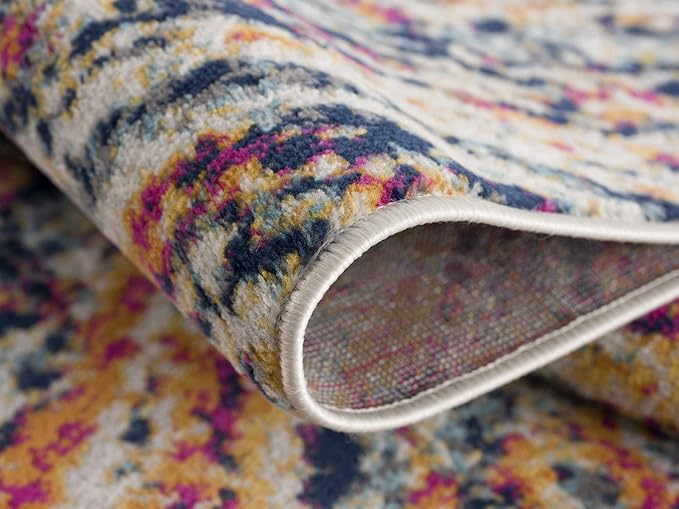 Close-up of colorful textured rug edge.