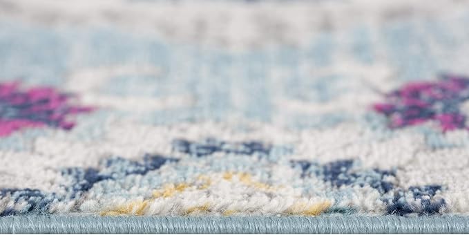 Close-up of blue patterned carpet.
