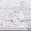 Textured area rug with blue and white pattern.