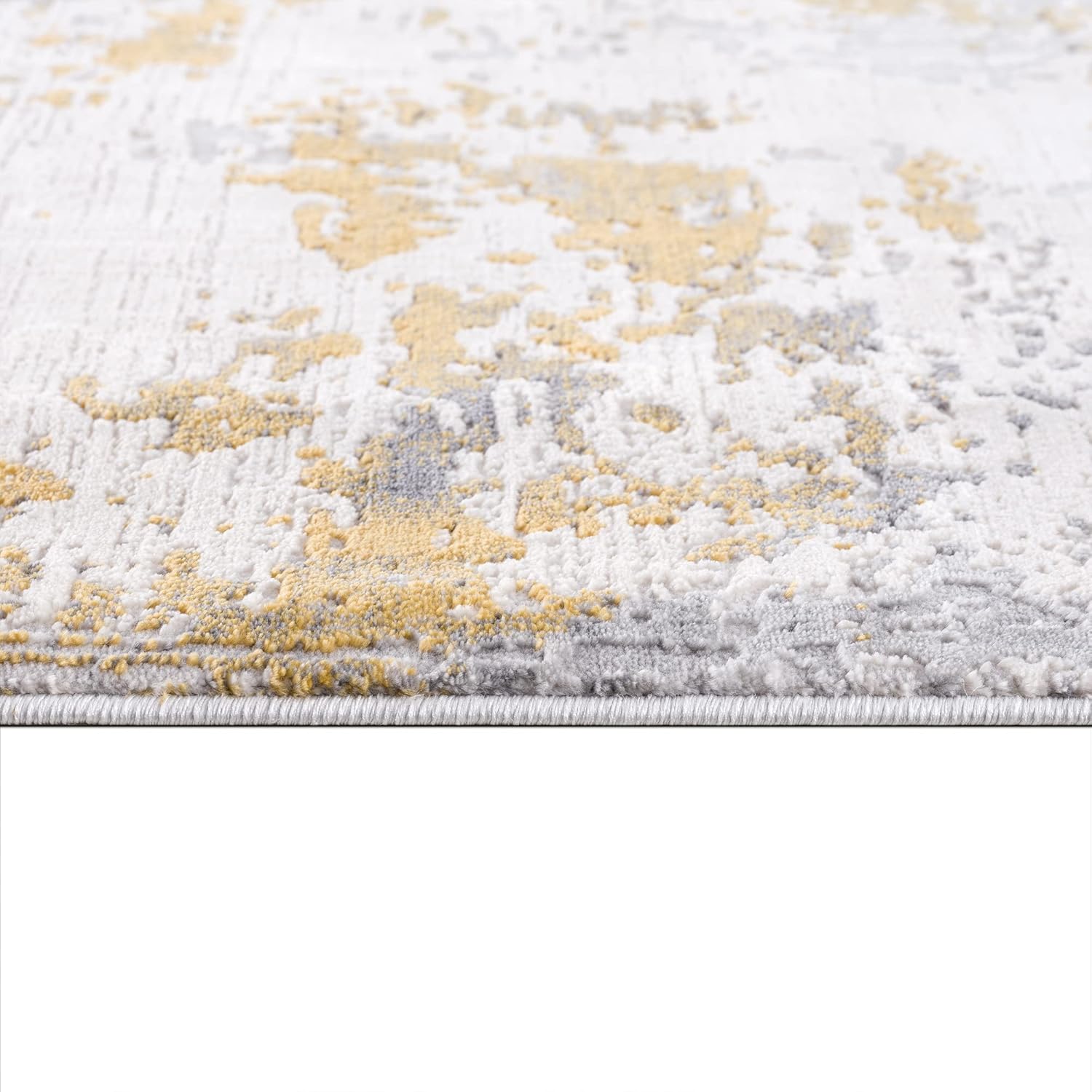Close-up of patterned beige and gray carpet