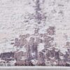 Close-up of textured abstract rug pattern.