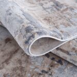 Abstract design beige and gray area rug
