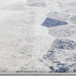 Close-up of patterned blue and gray rug
