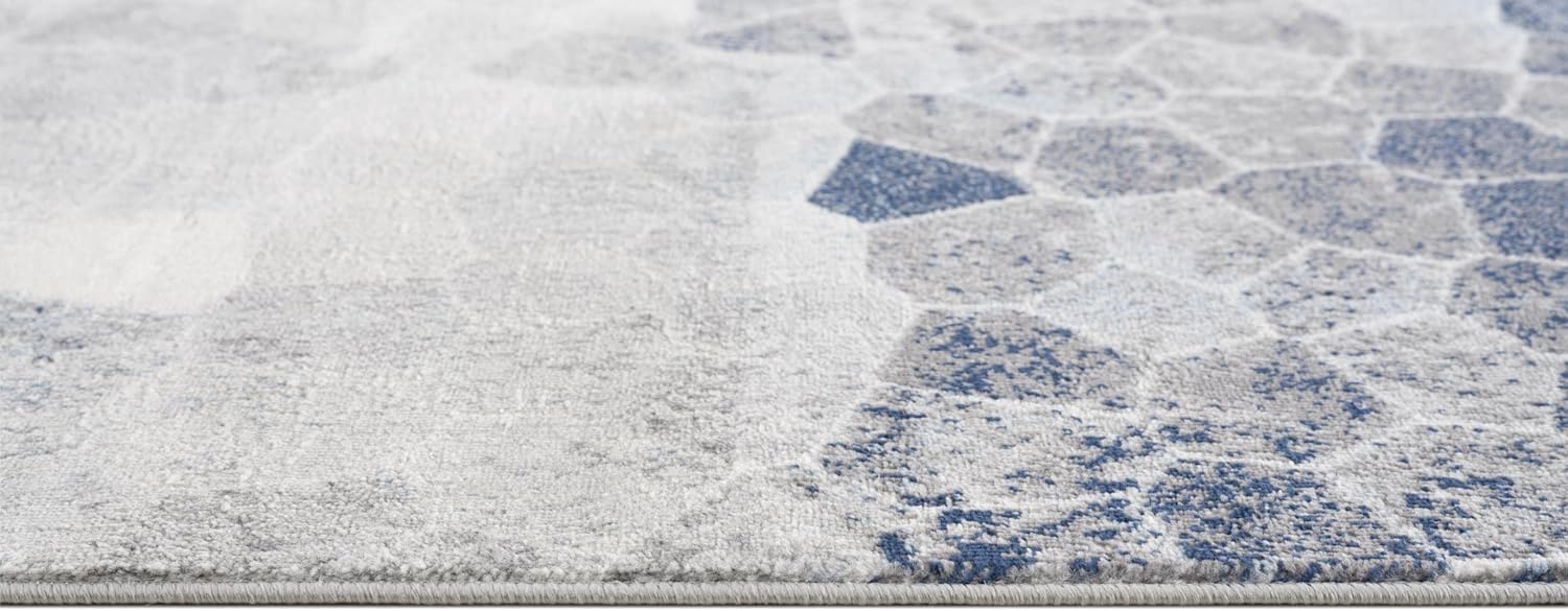 Close-up of patterned blue and gray rug