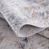 Textured area rug with geometric pattern
