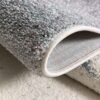 Close-up of rolled gray carpet texture