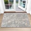 Stylish floral pattern rug by patio door.