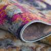 Colorful abstract pattern on textured rug