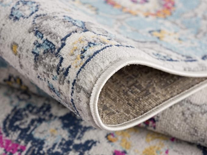 Close-up of colorful, patterned area rug corner.