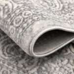 Close-up of textured gray patterned rug