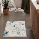 Modern bathroom with abstract design rug