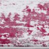 Red and white abstract patterned rug close-up.