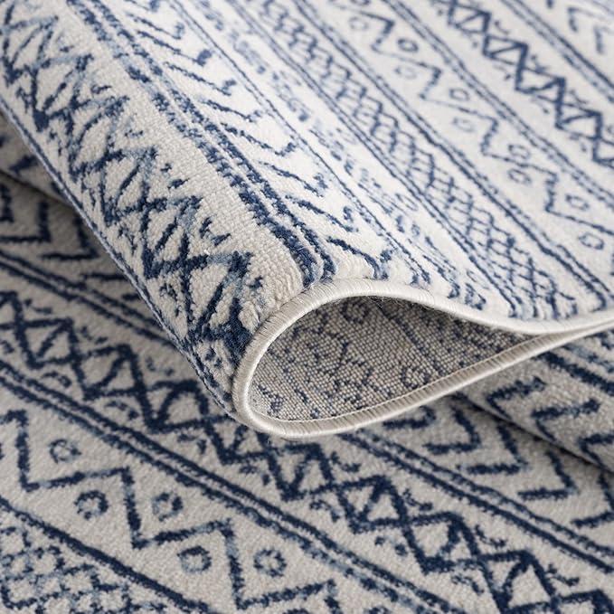 Blue patterned fabric rug close-up view