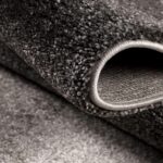 Close-up of gray carpet roll texture