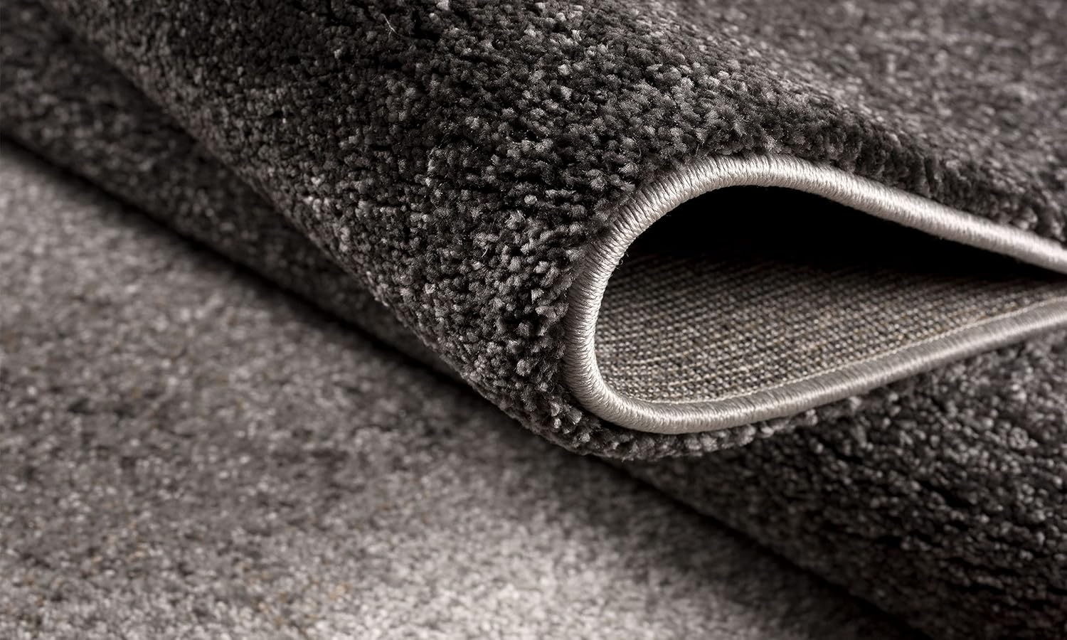Close-up of gray carpet roll texture