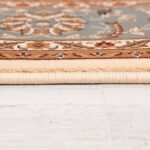 Close-up of decorative rug edge on floor