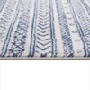Blue and white patterned rug close-up