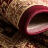 Close-up of rolled Persian-style carpet