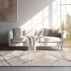 Modern living room with stylish sofa and rug.