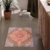 Bathroom interior with colorful patterned rug