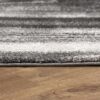 Gray carpet on wooden floor
