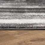 Gray carpet on wooden floor