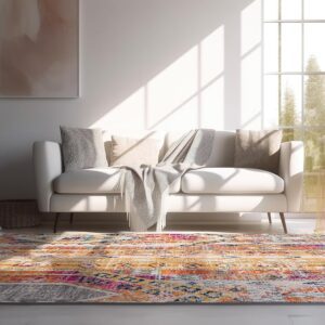 Cozy living room with colorful rug and white sofa.