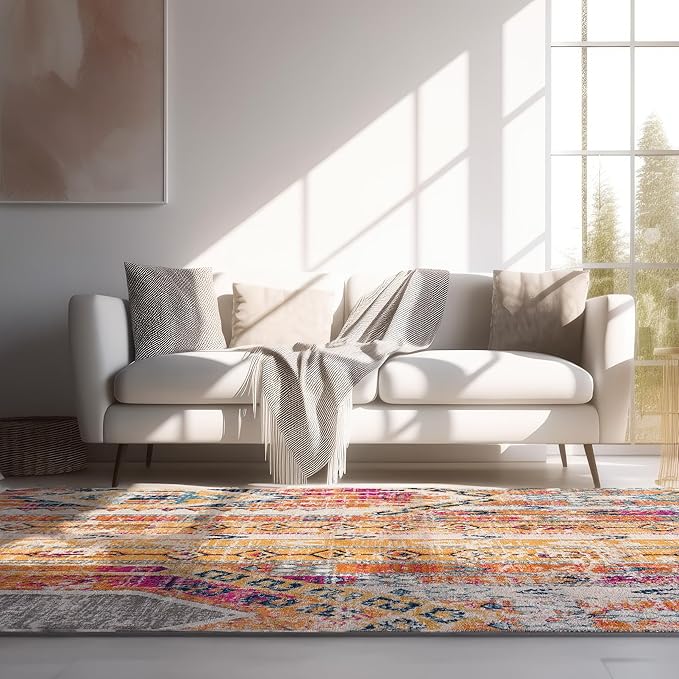 Cozy living room with colorful rug and white sofa.