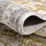 Gray and yellow textured rolled carpet close-up