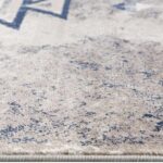 Beige rug with blue geometric design