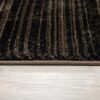 Brown and black striped carpet on wooden floor
