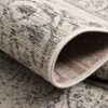 Close-up of rolled patterned rug texture