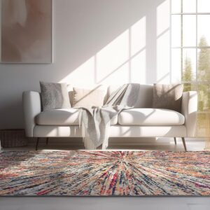 Cozy living room with colorful rug and sofa.