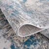 Gray and blue patterned rug close-up
