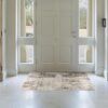 Elegant foyer with large white front door