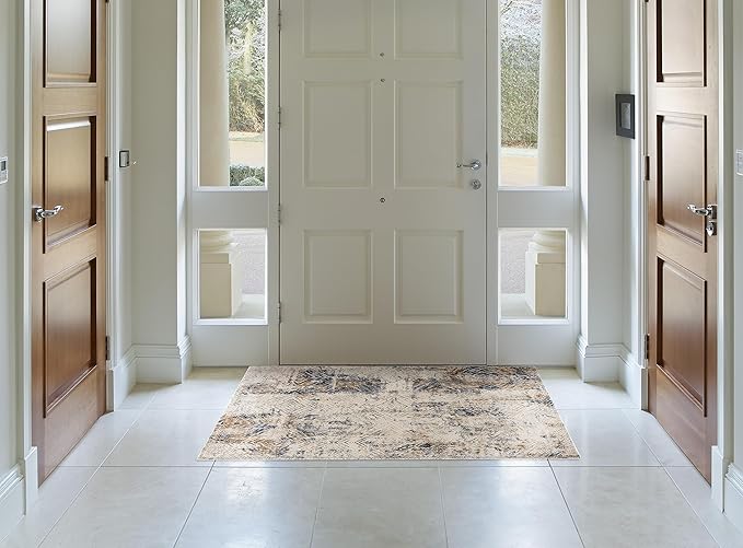 Elegant foyer with large white front door