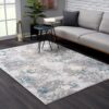 Modern living room with abstract patterned rug.