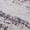 Abstract brown and beige textured rug close-up