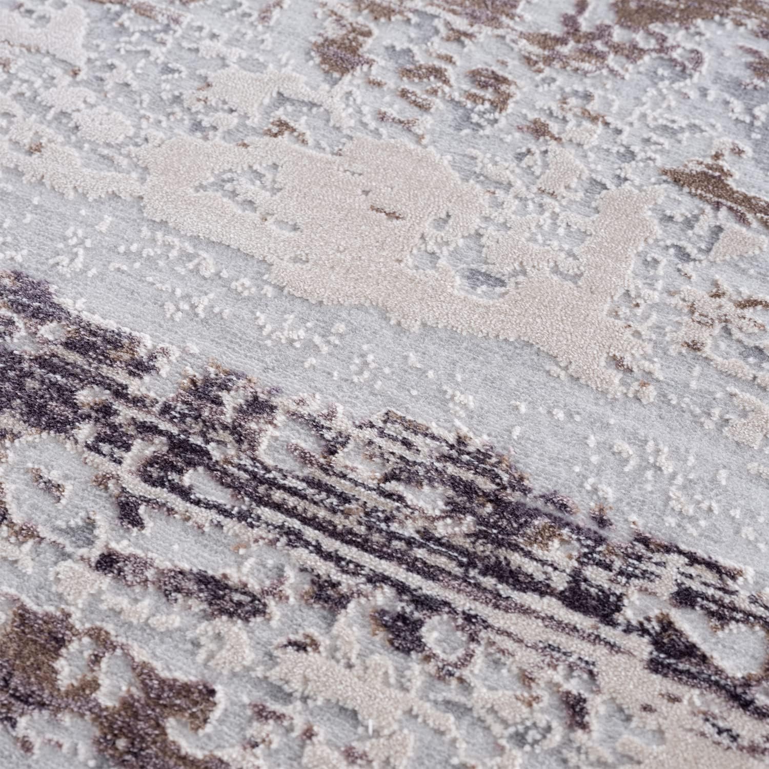 Abstract brown and beige textured rug close-up