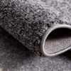 Close-up of rolled gray carpet texture