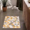 Geometric bathroom rug with triangles on floor