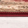 Close-up of ornate red and beige rug