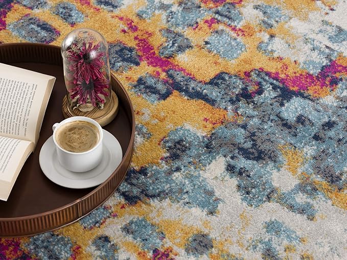 Colorful rug with tray holding coffee and book