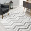 Gray zigzag pattern rug in modern living room.