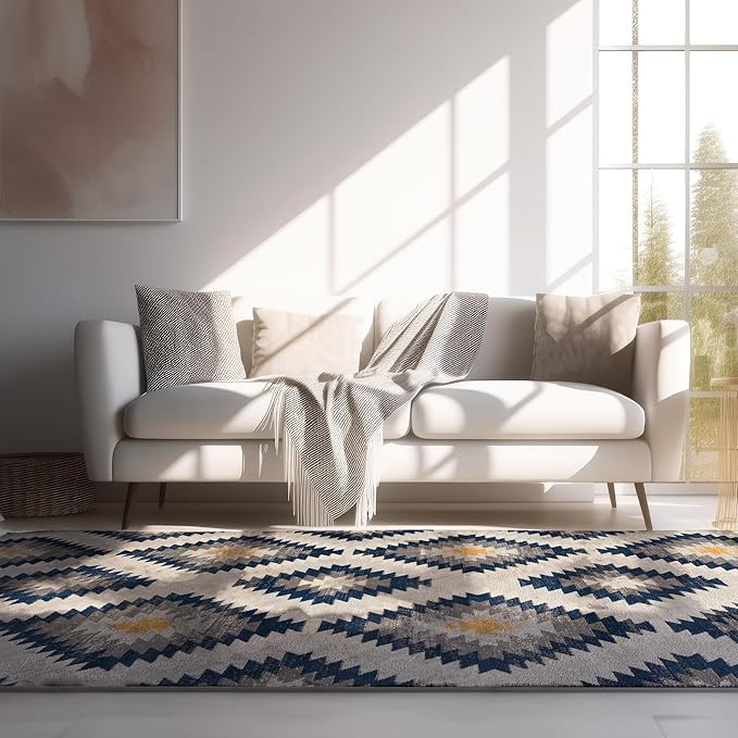 Modern living room with sofa and patterned rug.