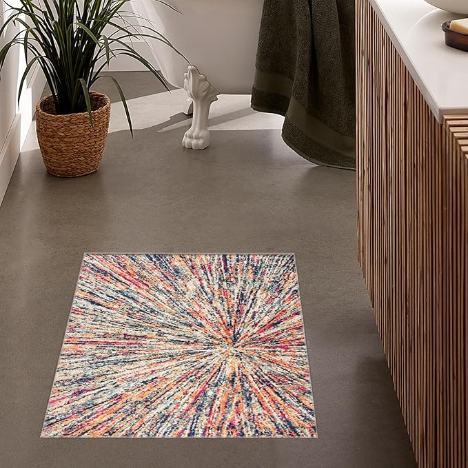 Colorful bathroom rug with abstract pattern.